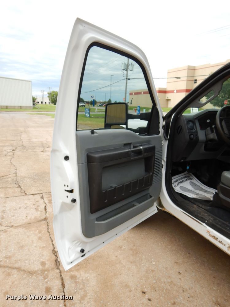 image for item FK9766 2014 Ford F550 Crew Cab flatbed truck