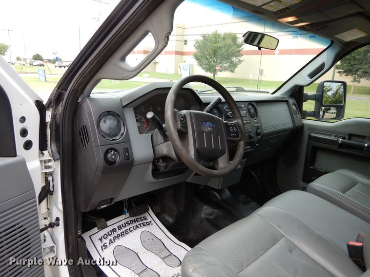 image for item FK9766 2014 Ford F550 Crew Cab flatbed truck