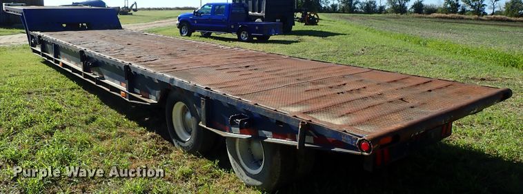 image for item DB7704 1978 Landoll drop tilt deck equipment trailer