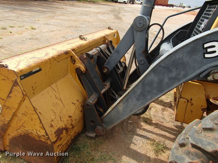image for item DG0215 2012 John Deere 310SJ backhoe