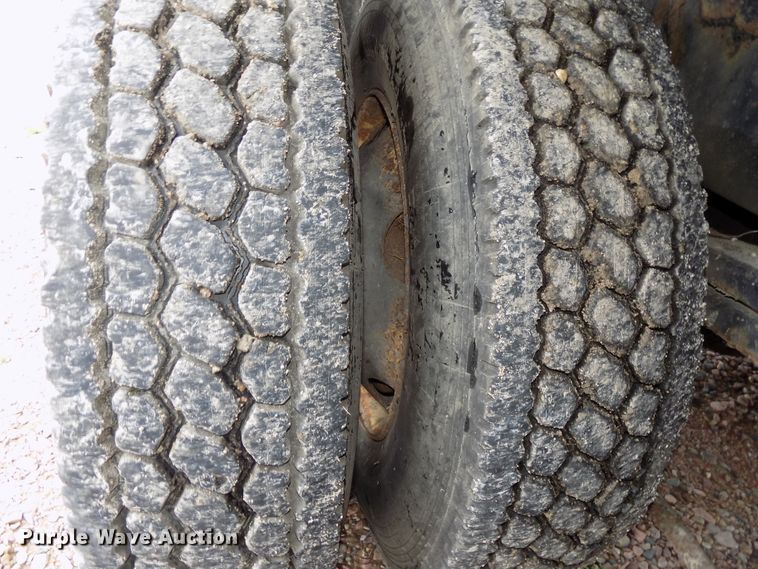 image for item DG2456 2004 Sterling LT7500 flatbed truck