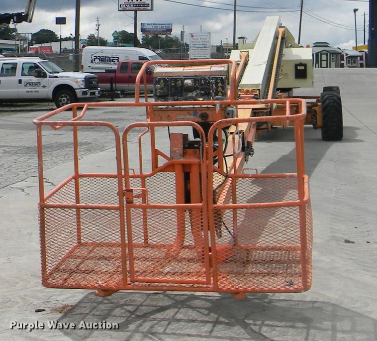 image for item G1936 1999 JLG 120HX boom lift