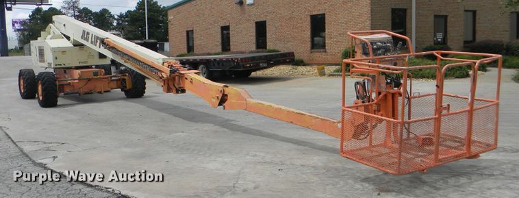 image for item G1936 1999 JLG 120HX boom lift
