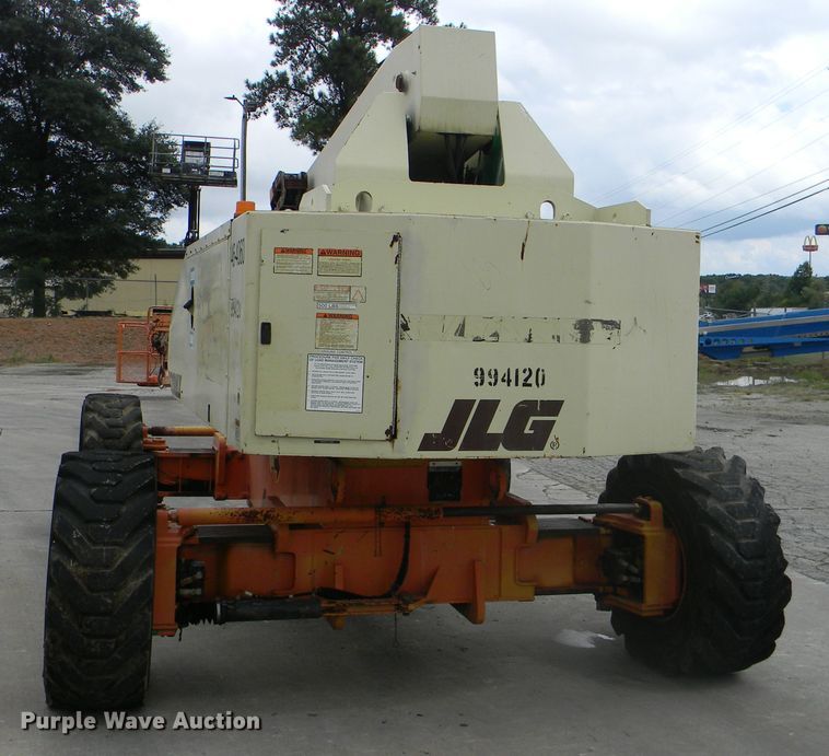 image for item G1936 1999 JLG 120HX boom lift