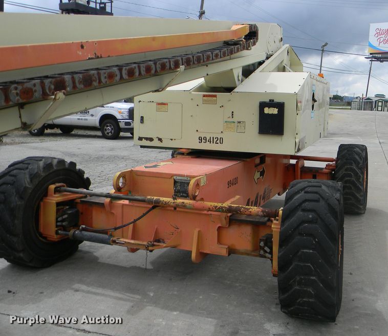 image for item G1936 1999 JLG 120HX boom lift