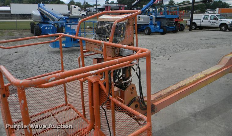 image for item G1936 1999 JLG 120HX boom lift
