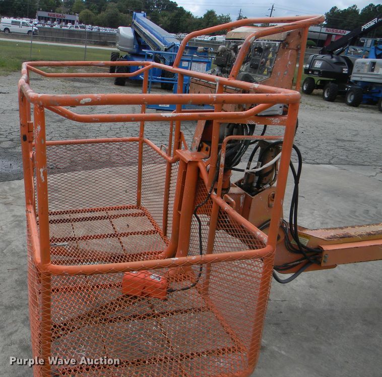 image for item G1936 1999 JLG 120HX boom lift