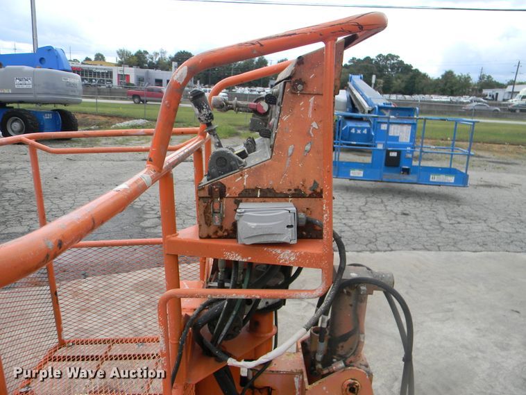 image for item G1936 1999 JLG 120HX boom lift