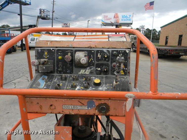 image for item G1936 1999 JLG 120HX boom lift