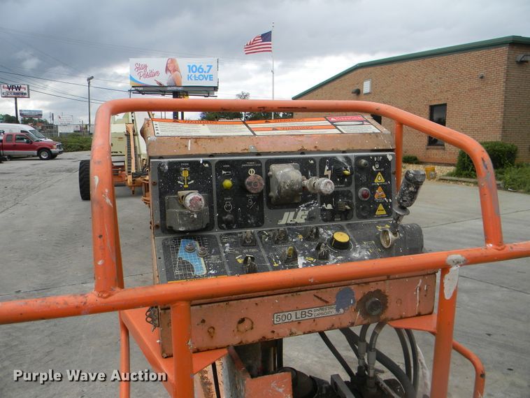 image for item G1936 1999 JLG 120HX boom lift