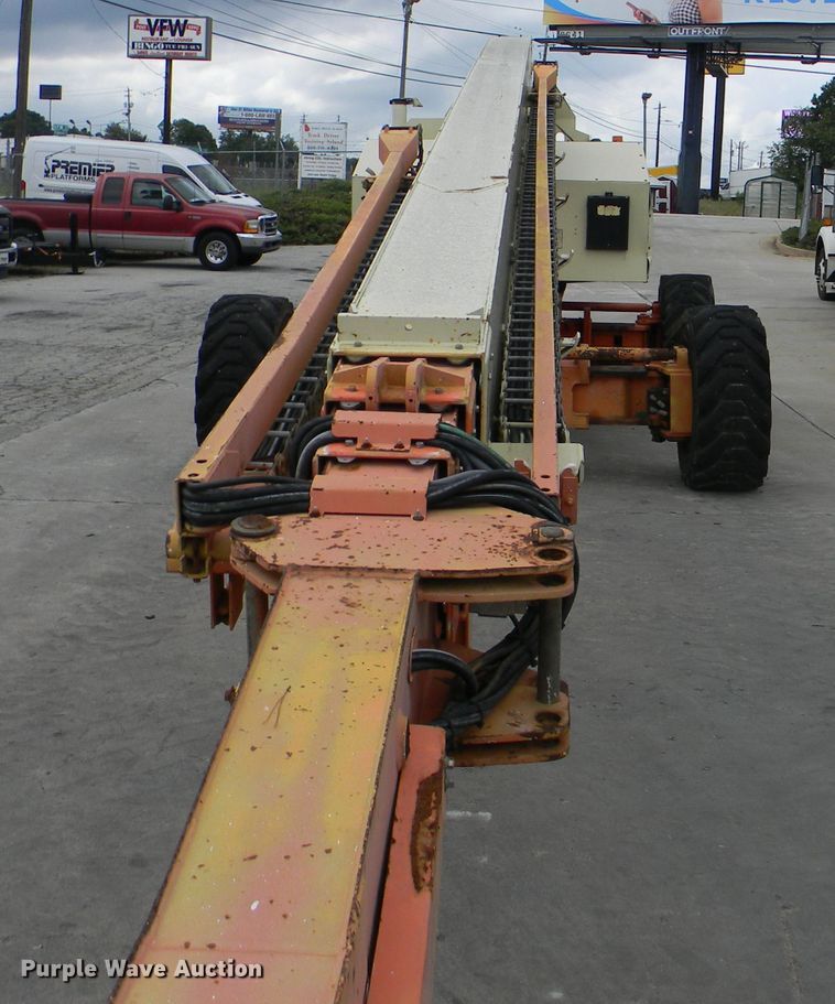 image for item G1936 1999 JLG 120HX boom lift