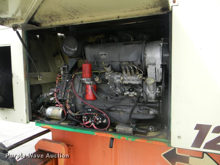 image for item G1936 1999 JLG 120HX boom lift