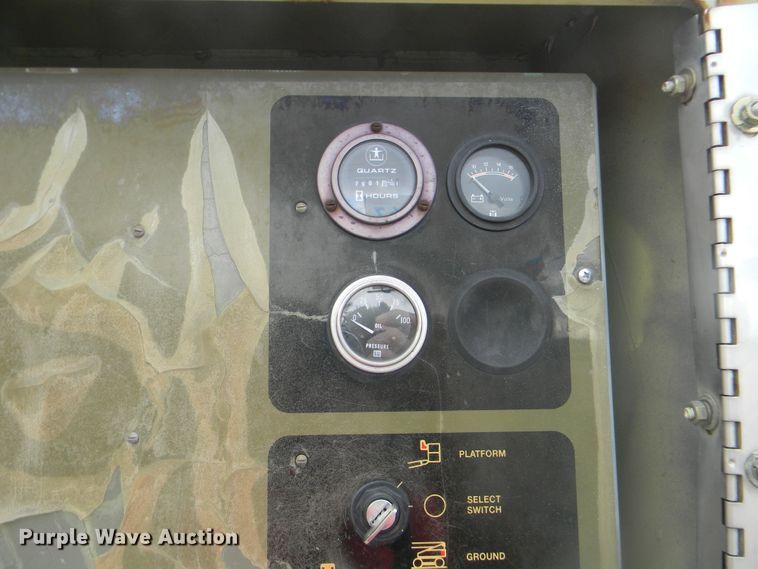 image for item G1936 1999 JLG 120HX boom lift