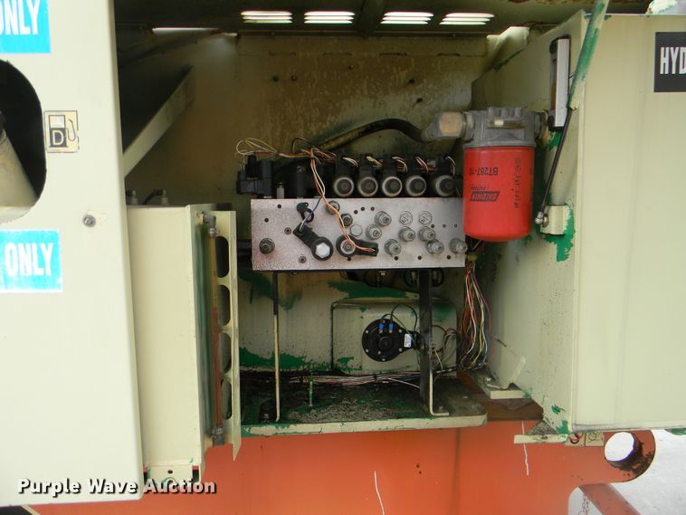 image for item G1936 1999 JLG 120HX boom lift