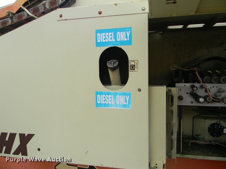 image for item G1936 1999 JLG 120HX boom lift