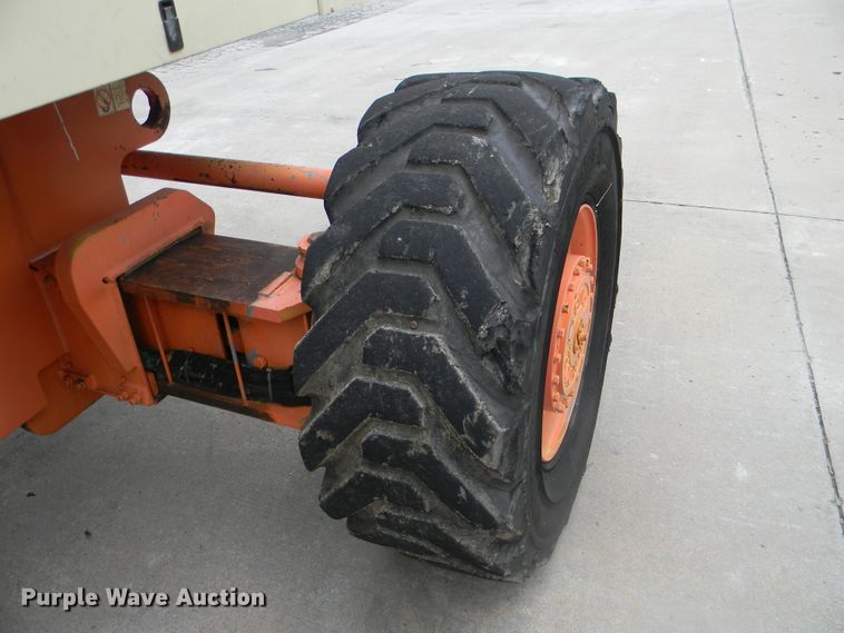 image for item G1936 1999 JLG 120HX boom lift