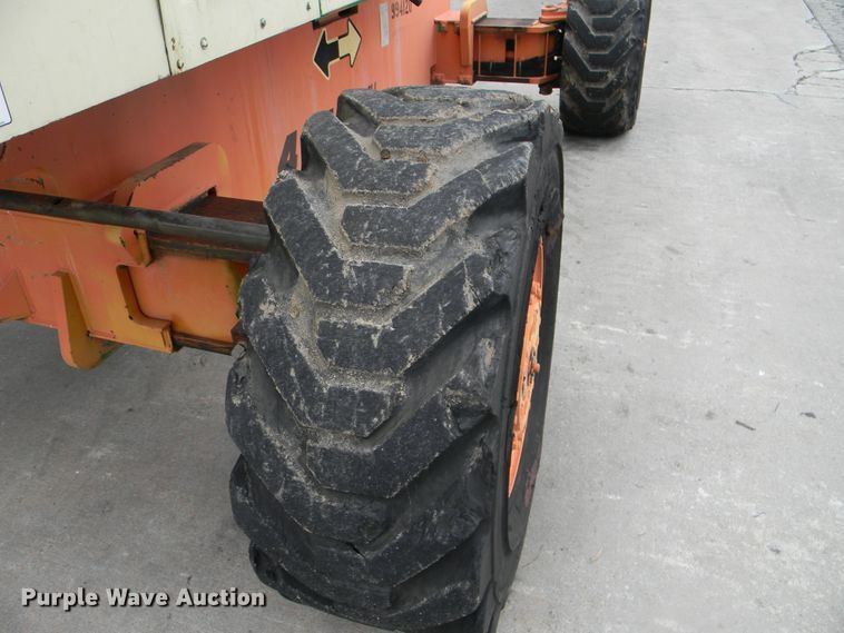 image for item G1936 1999 JLG 120HX boom lift