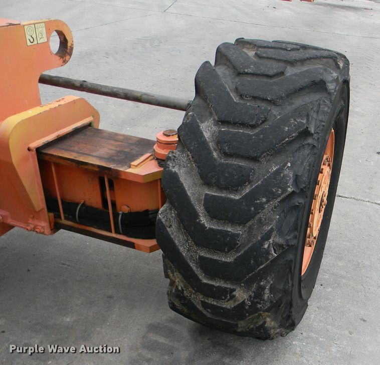 image for item G1936 1999 JLG 120HX boom lift