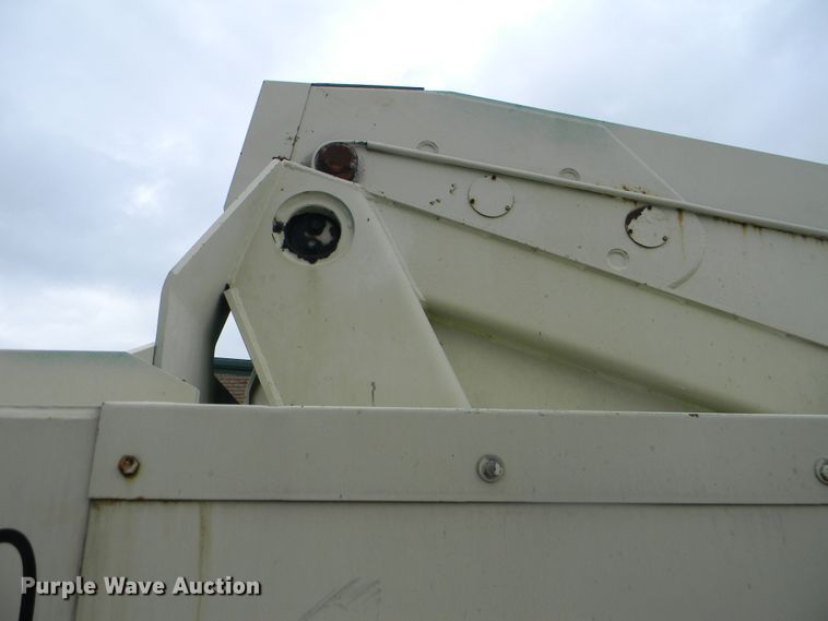 image for item G1936 1999 JLG 120HX boom lift