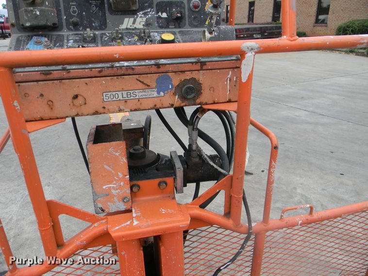 image for item G1936 1999 JLG 120HX boom lift