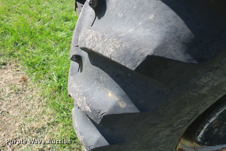 image for item DB10166 2005 New Holland TV145 bi-directional 4WD tractor