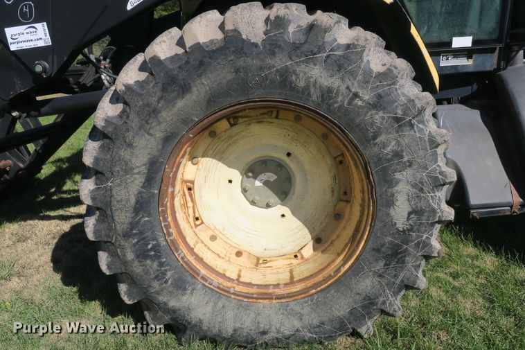 image for item DB10166 2005 New Holland TV145 bi-directional 4WD tractor