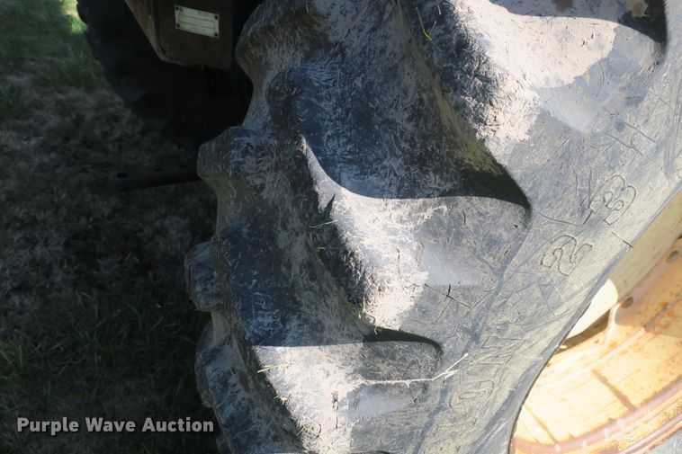 image for item DB10166 2005 New Holland TV145 bi-directional 4WD tractor