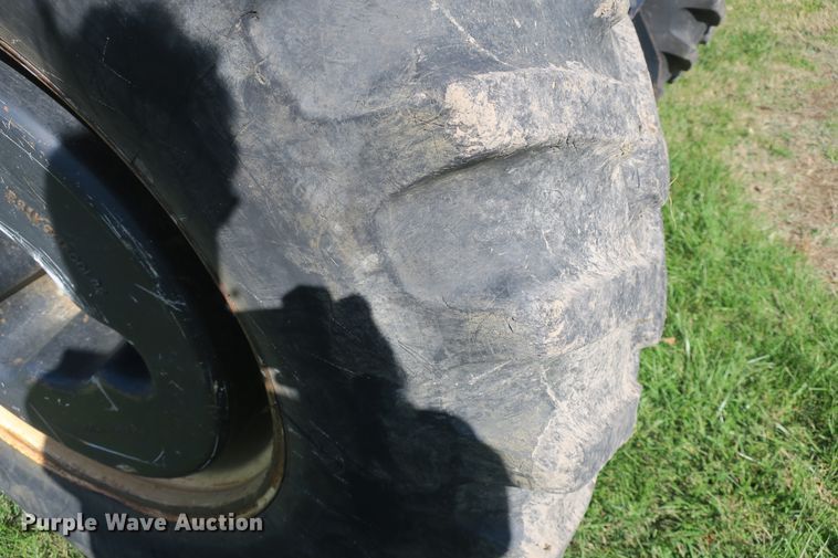 image for item DB10166 2005 New Holland TV145 bi-directional 4WD tractor