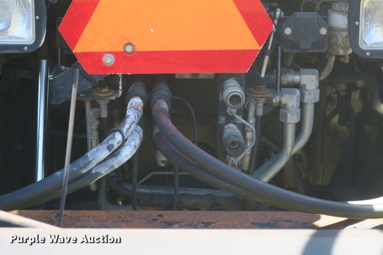 image for item DB10166 2005 New Holland TV145 bi-directional 4WD tractor