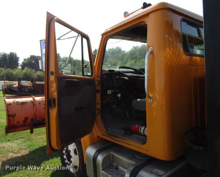 image for item DG8208 2002 International 4900 flatbed truck