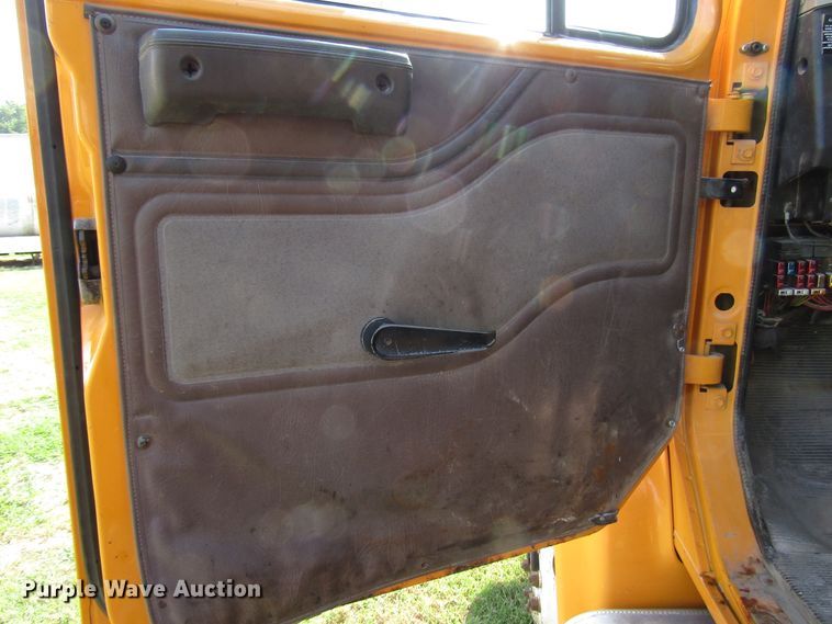 image for item DG8208 2002 International 4900 flatbed truck