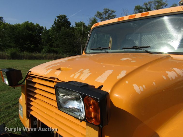 image for item DG8208 2002 International 4900 flatbed truck