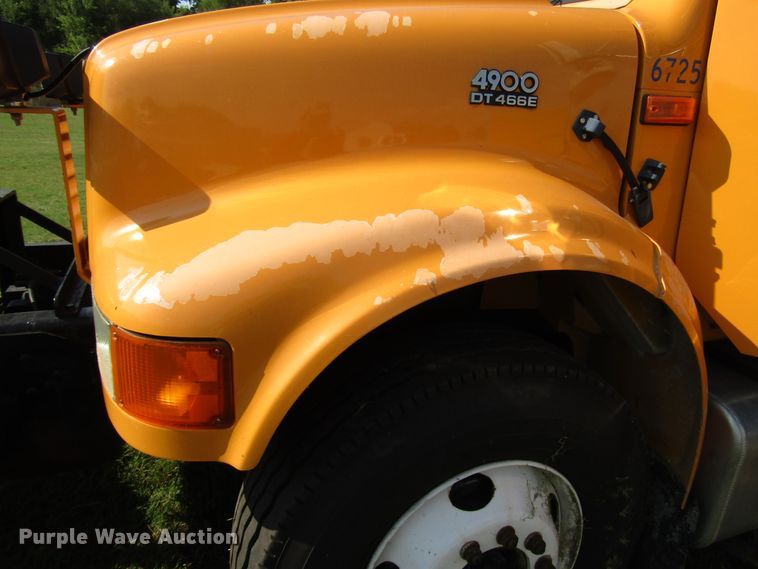 image for item DG8208 2002 International 4900 flatbed truck