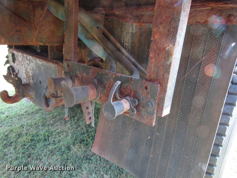 image for item DG8208 2002 International 4900 flatbed truck