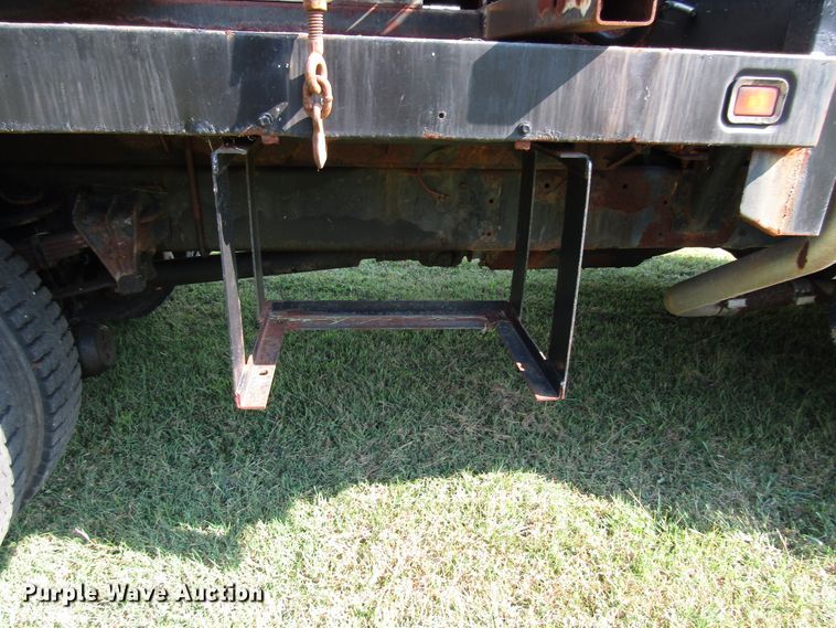 image for item DG8208 2002 International 4900 flatbed truck