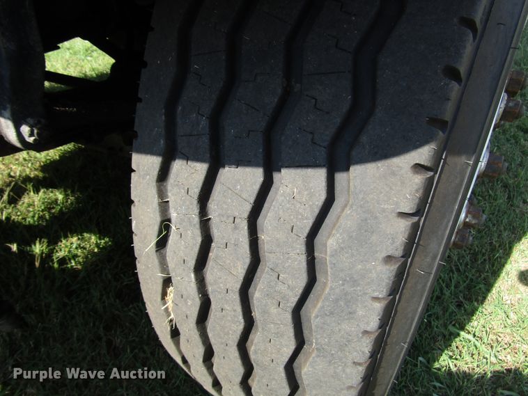 image for item DG8208 2002 International 4900 flatbed truck