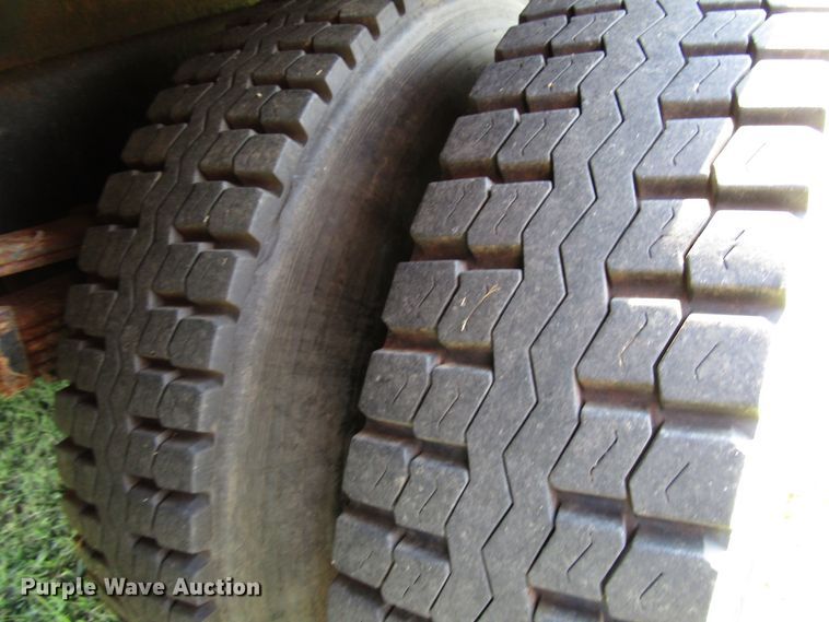 image for item DG8208 2002 International 4900 flatbed truck