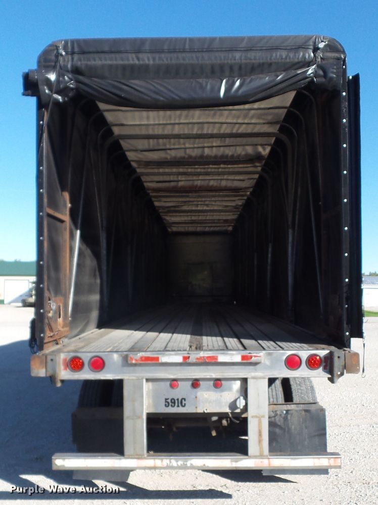 image for item DF0808 1998 Wabash National side curtain flatbed trailer