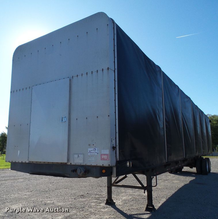image for item DF0808 1998 Wabash National side curtain flatbed trailer