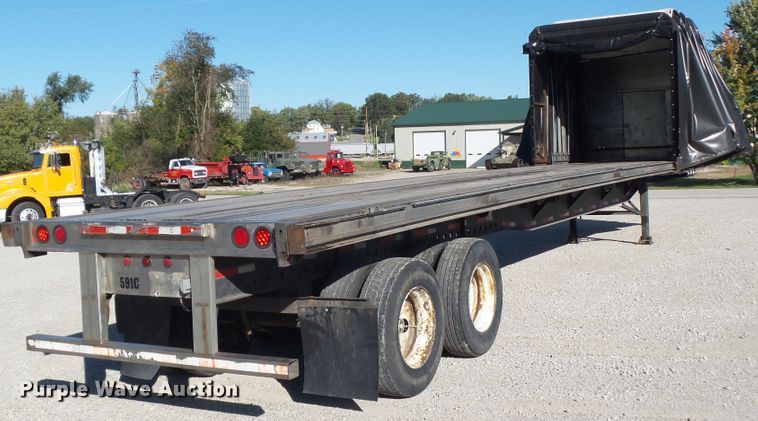 image for item DF0808 1998 Wabash National side curtain flatbed trailer