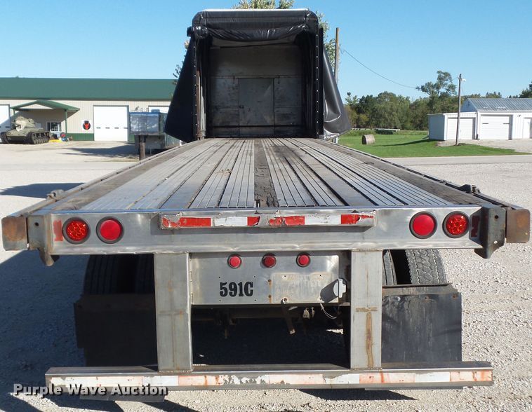 image for item DF0808 1998 Wabash National side curtain flatbed trailer