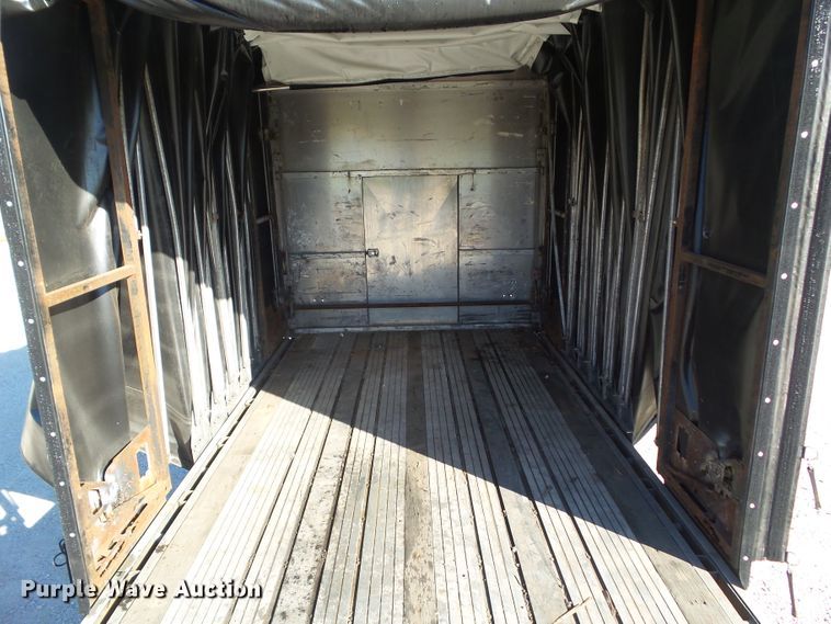 image for item DF0808 1998 Wabash National side curtain flatbed trailer