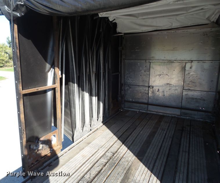 image for item DF0808 1998 Wabash National side curtain flatbed trailer