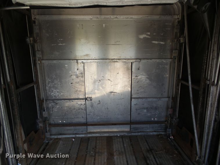 image for item DF0808 1998 Wabash National side curtain flatbed trailer