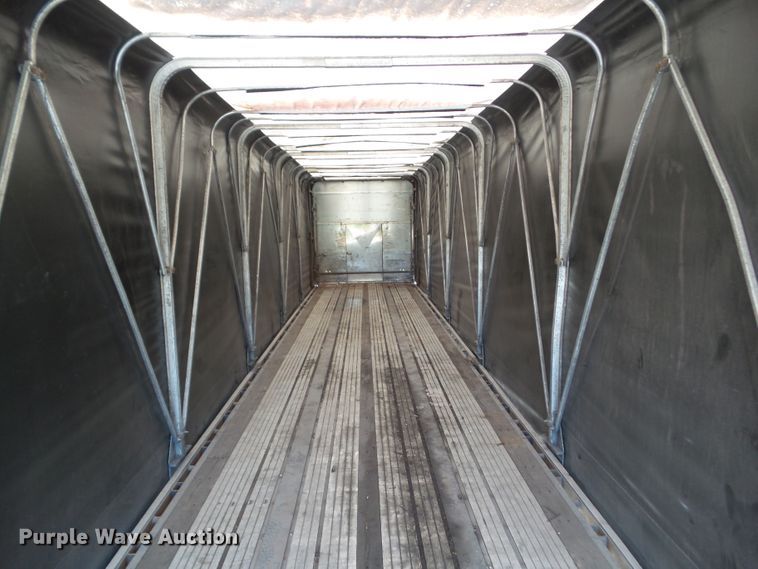image for item DF0808 1998 Wabash National side curtain flatbed trailer