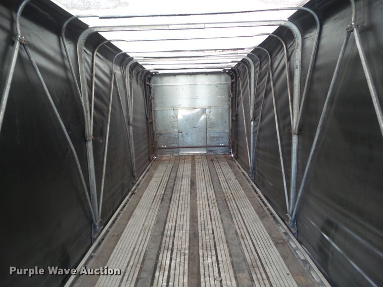image for item DF0808 1998 Wabash National side curtain flatbed trailer