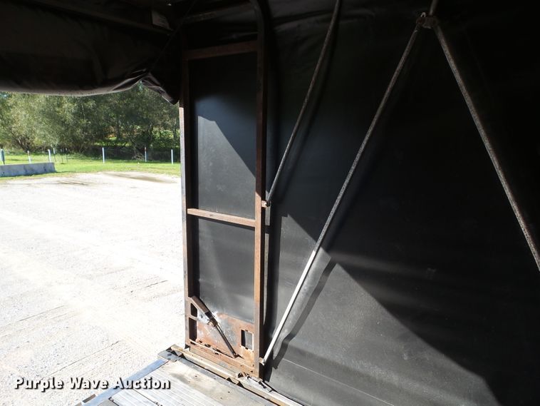 image for item DF0808 1998 Wabash National side curtain flatbed trailer