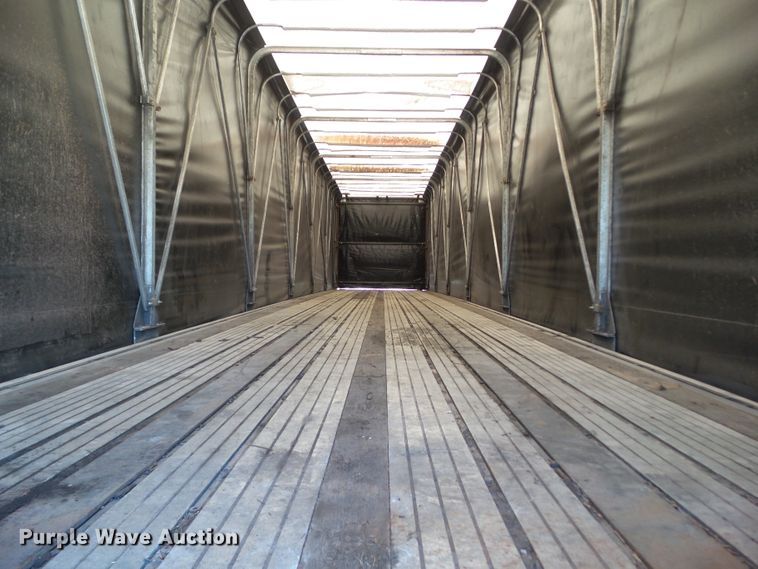 image for item DF0808 1998 Wabash National side curtain flatbed trailer