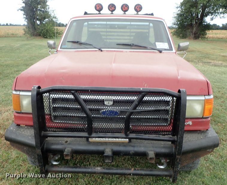 image for item DB7707 1990 Ford F250 flatbed pickup truck