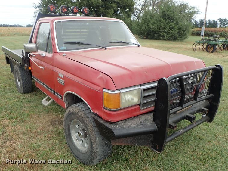 image for item DB7707 1990 Ford F250 flatbed pickup truck